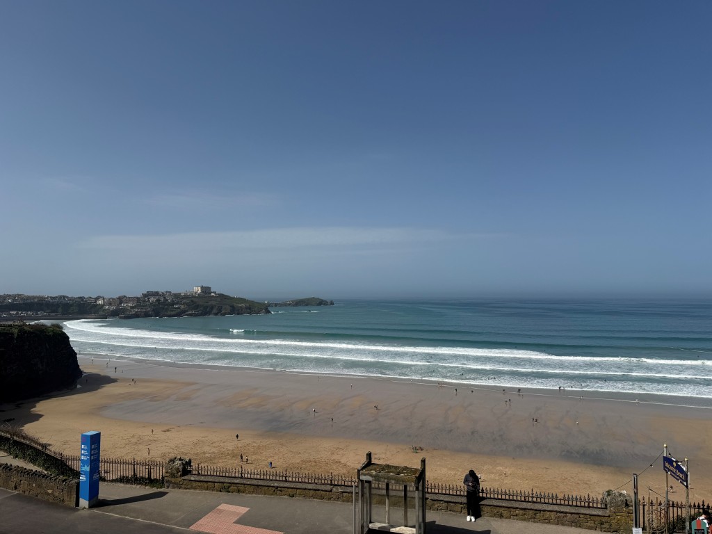 Lot: 132 - SPACIOUS TWO-BEDROOM APARTMENT WITH STUNNING SEA VIEWS AND PARKING - View of Tolcarne Beach taken from apartments balcony